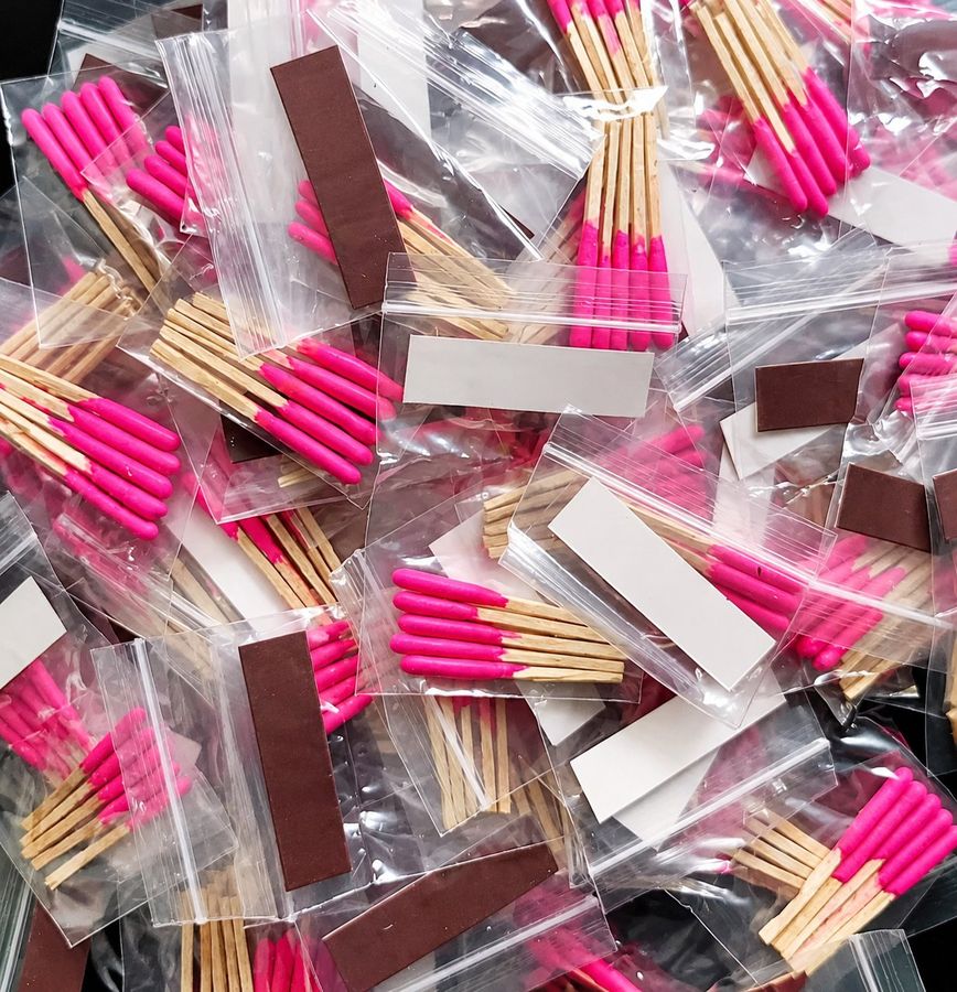 Zip bags with striker strip