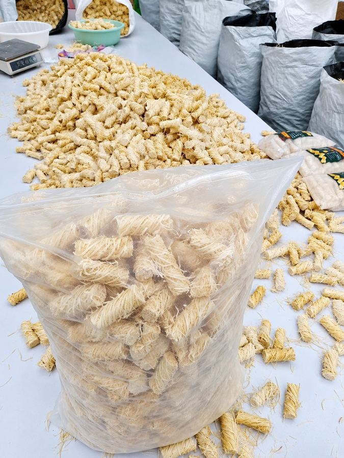 Bagged firelighters on the packing table